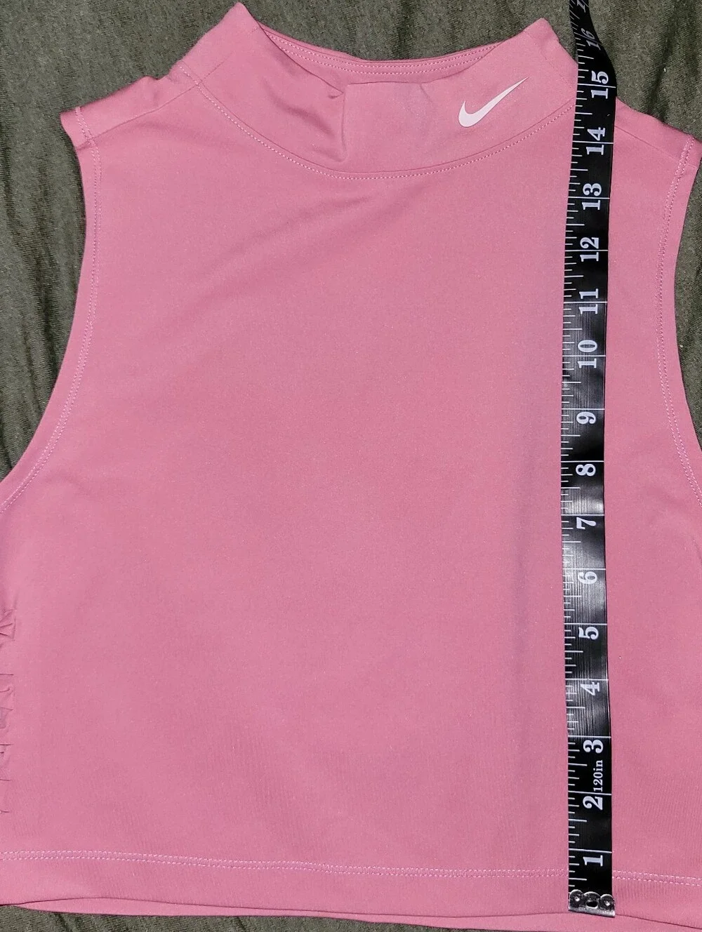 pink Nike Pro Dri-FIT crop top featuring distinctive side-cutout details